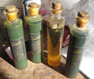 Set Of 4 Waverly Oil Works Clear Pharmacy Apothecary Bottles With Corks Intact photo