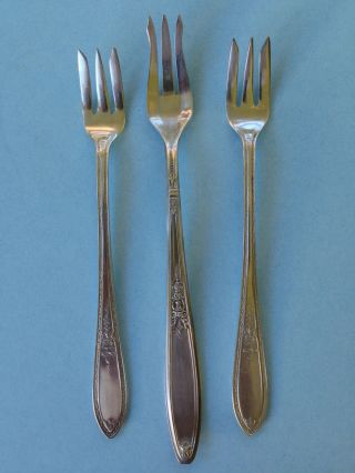 3 Antique Silverplate Cocktail Forks – Rogers photo