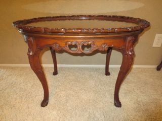 Antique Oval Coffee Table With Inlaid Design photo