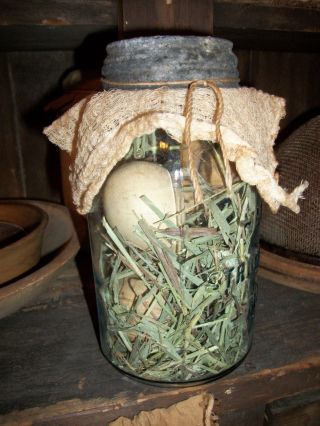 Prim Antique Blue Mason Jar Filled With Straw And Gourd Eggs photo