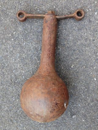 Heavy Old Iron Counter Weight - C.  E.  Shepherd,  Houston,  Texas photo