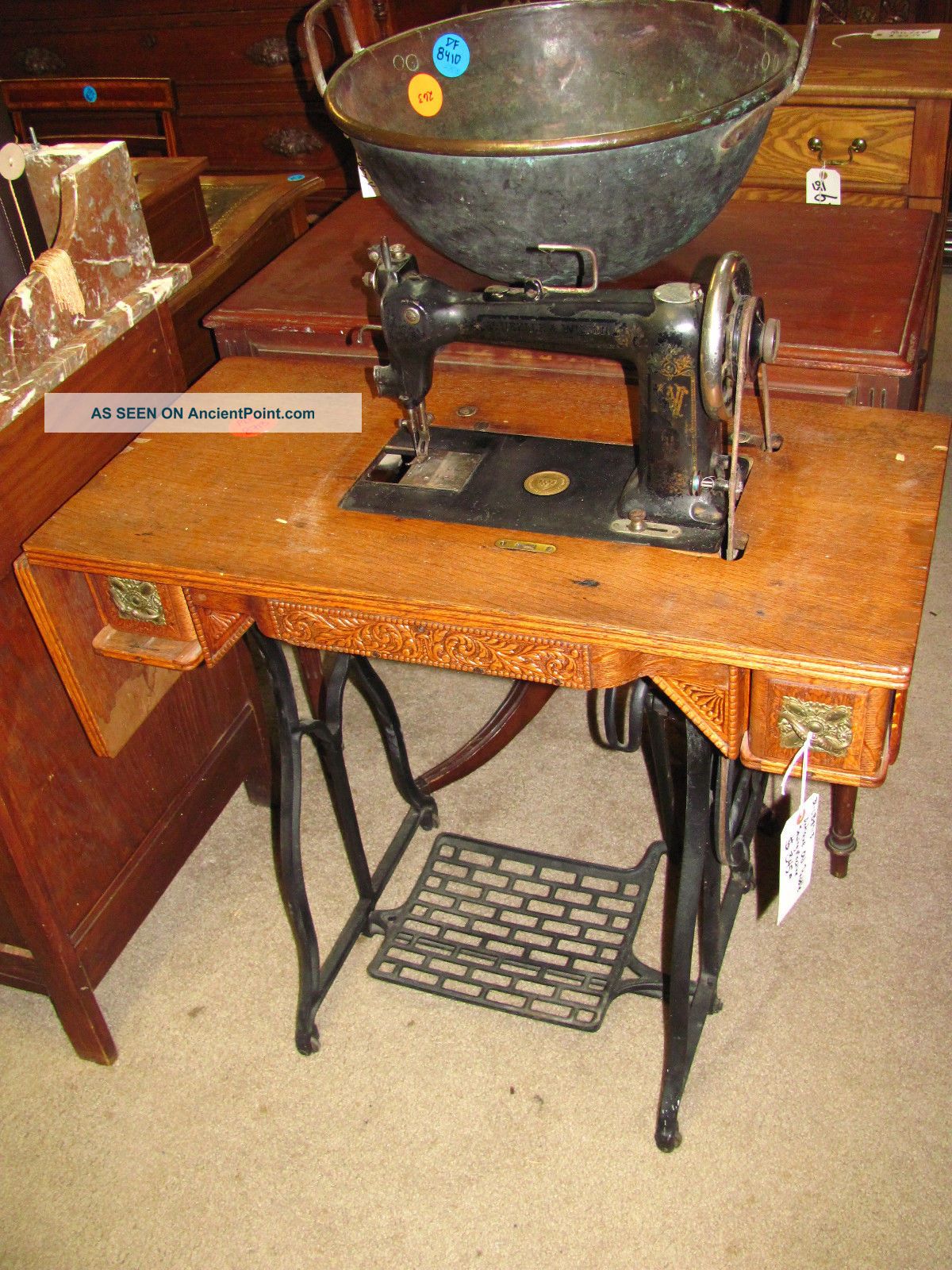 Antique Peddle Sewing Machine With Oak Table Sewing Machines photo