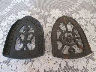 2 Antique Cast Iron Trivets Colebrookdale Iron Co.  & Wh Howell Co. photo