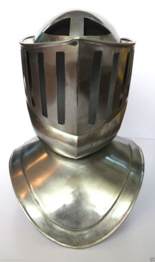 Medieval Closed Armor Helmet Opening From Front Made Of Steel photo