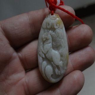 100% Pure Natural Xinjiang Hetian Jade,  With Yellow Leather（horse） photo