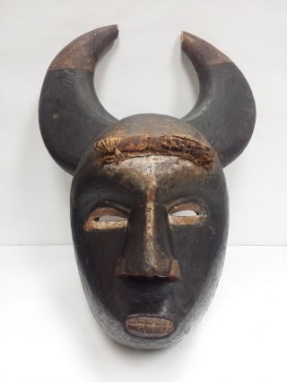 Antique African Igbo Wood Carved Mask With Horns photo