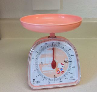Pink Hello Kitty Goes To Bakery Kitchen Scale Weighs By Gram Up To 2 Kilograms photo