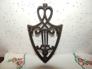 Antique Cast Iron Trivet Hot Pad Musical Symbols 3 Feet Rare,  Hard To Find. photo