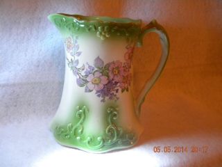 Green Pitcher With Flowers Unmarked photo