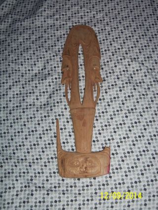 Papua New Guinea,  Two Faced Spirit Mask Carving,  Broken Piece photo