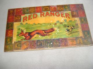 Something Different Collectible Red Ranger Cigar Box Lid Covered With Old Stamps photo