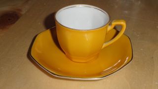 Demitasse Cup And Saucer - Gold Colored W/ Gold Trim photo