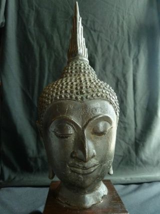 Antique Thai Bronze Buddha Head Sculpture On Wooden Base photo