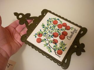 Vintage Kitchen Trivet Ceramic Tile / Ornate Oriental - Cast Iron - Cranberries photo