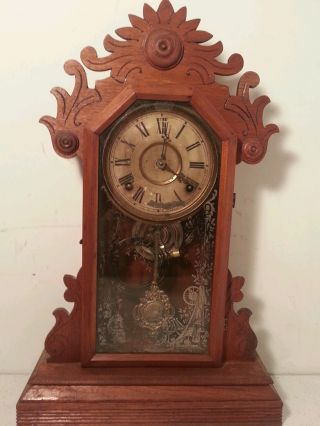 Antique Mantle Mahogany Gingerbread Winding Clock photo