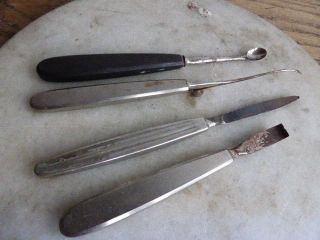 Four Vintage Surgical Instruments photo