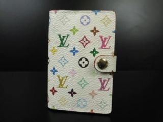 Louis Vuitton Handbook Cover Multicolor Beauty Products photo