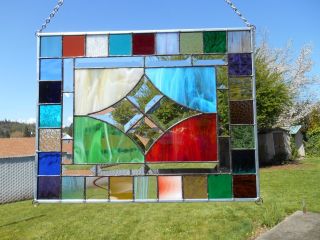 Multi Colored Stained Glass Panel With Textured Clears photo
