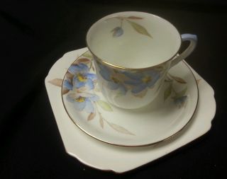Shelley Tea Cup And Saucer Trio Blue And Yellow Flowers Ideal China D50101 photo