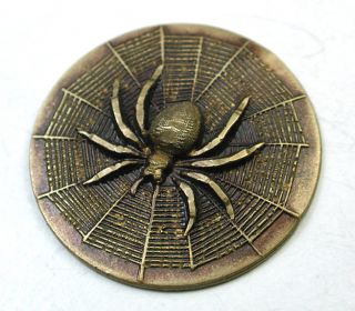 Antique Stamped Brass Button Spider In Web Design photo