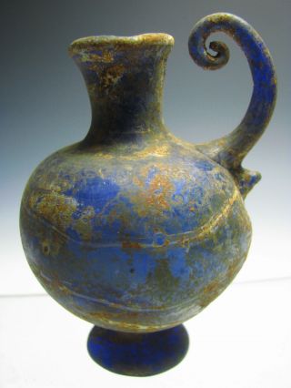 A Ancient Roman Glass Bottle photo
