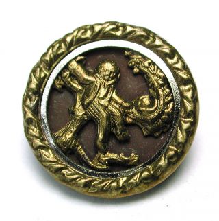 Antique Brass Button Boy Sitting On A Tree Branch photo