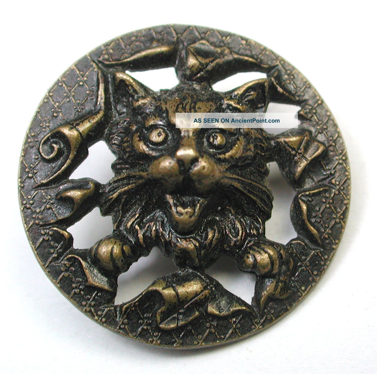 Antique Pierced Brass Button Cat Face & Paw Bursting Through Buttons photo