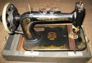 Antique Home Light Running Portable Sewing Machine photo