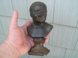 An Outstanding Unsual Creepy Antique Cast Iron Baby Crying Bust Statue Metalware photo