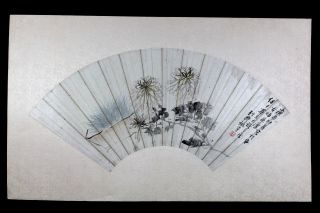 Old Chinese Fan Painting Of Flowers And Calligraphy photo