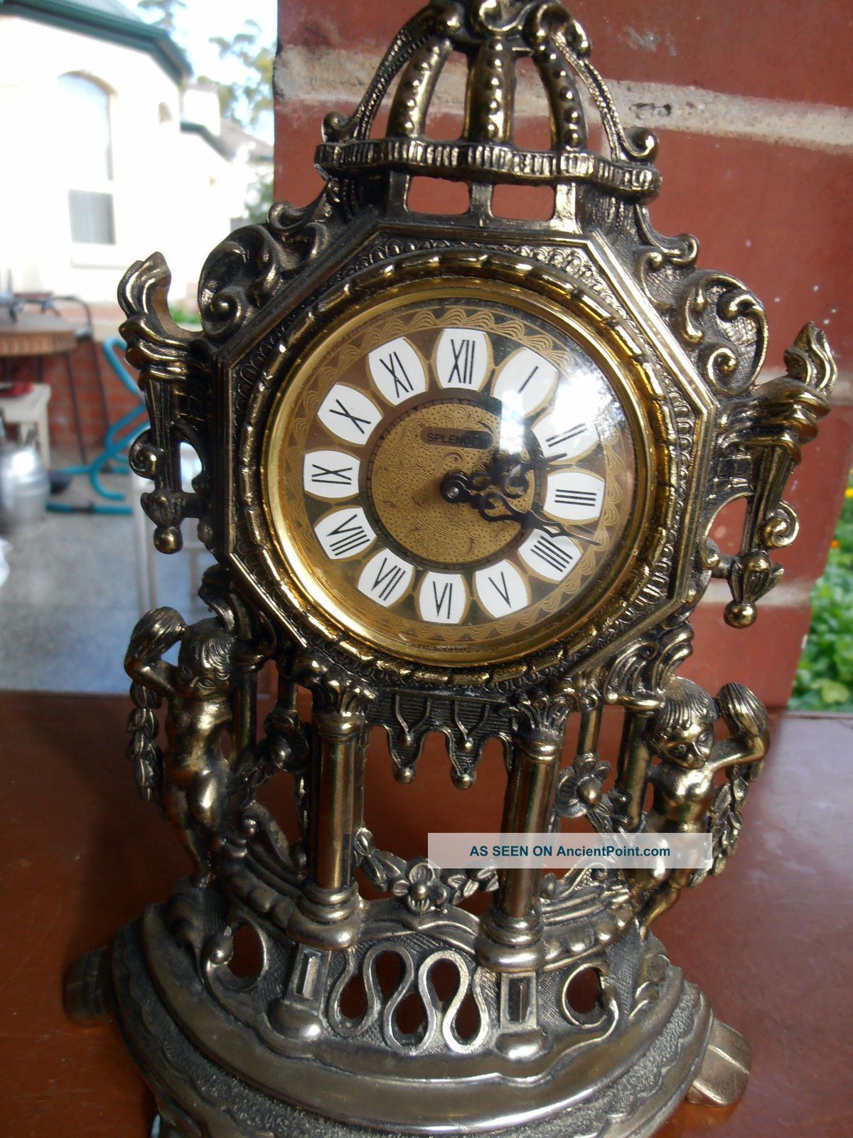 Antique Clock Metal Mantle Slendex Clocks Cherubs Torch Windup Rear Value Clocks photo