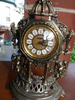 Antique Clock Metal Mantle Slendex Clocks Cherubs Torch Windup Rear Value photo