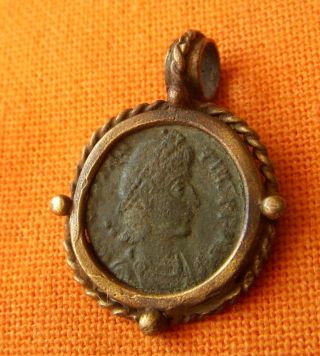 A496.  Roman Style Bronze Pendant With Authentic Roman Bronze Coin. photo