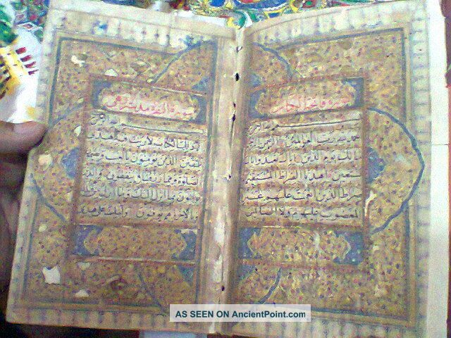 Hand Written Holy Quran Fine Calligraphy.  Illumination Islamic photo