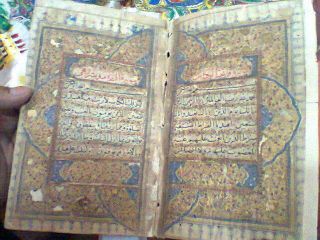 Hand Written Holy Quran Fine Calligraphy.  Illumination photo