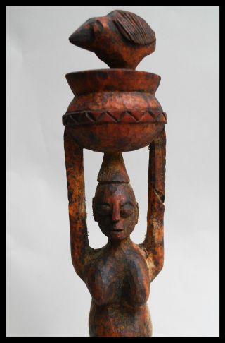 A Water Carrier Altar Figure From The Nagu People Of Benin,  With Human & Bird photo