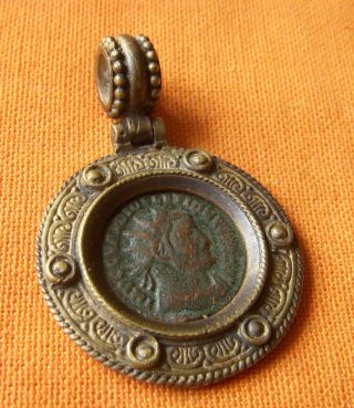 A537.  Roman Style Bronze Pendant With Authentic Roman Bronze Coin. photo