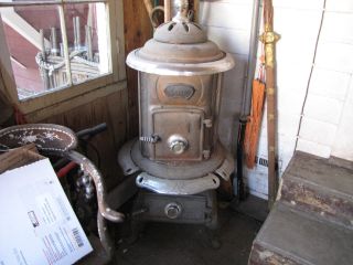 Antique Cast Iron Stove / Heater Wood Or Coal With Chrome Accents Pot Belly photo