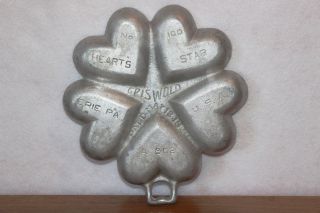Vintage 1920 Griswold No 100 Heart Star A 802 Aluminum Gem Muffin Baking Pan photo