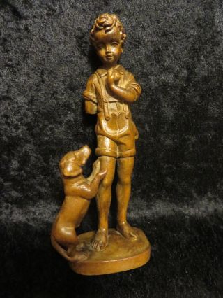 W.  U.  M.  Heinzeller Holzschnitzerel Carving Of Boy With Dog 6 1/2 Inches Tall photo