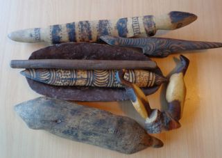 7 X Aboriginal Figures,  Coolamon & Clapping Sticks photo