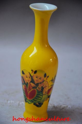 Chinese Yellow Porcelain Hand Painted Children Vase photo