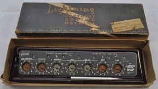 Vintage Lightning Portable Adding Machine,  With Subtracting Feature Box photo