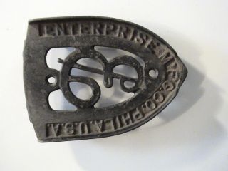 Vintage Enterprise Mfg.  Co.  Footed Sad Iron Trivet Phila.  U.  S.  A. photo