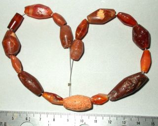 Ancient Carnelian Beads Bicone Sahara Trade 12 - 30mm Lengths photo