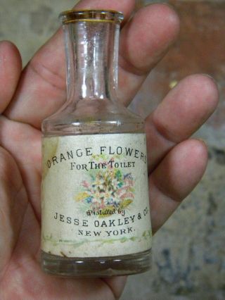 Rare Embossed & Labeled Antique Perfume Bottle Jess Oakley & Co. photo