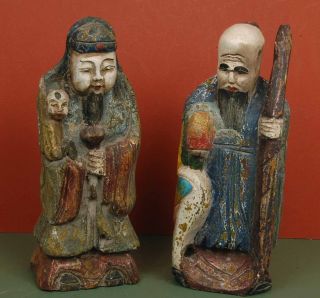 Two Vintage Wood Carvings From Thailand Man With Child & Man With Staff photo