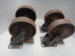 Vintage Heavy Duty Industrial Cast Iron Casters photo