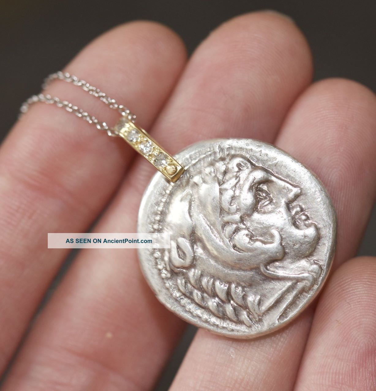 Ancient Coin Of Alexander The Great With 18ct Yellow Gold And Diamonds. Greek photo