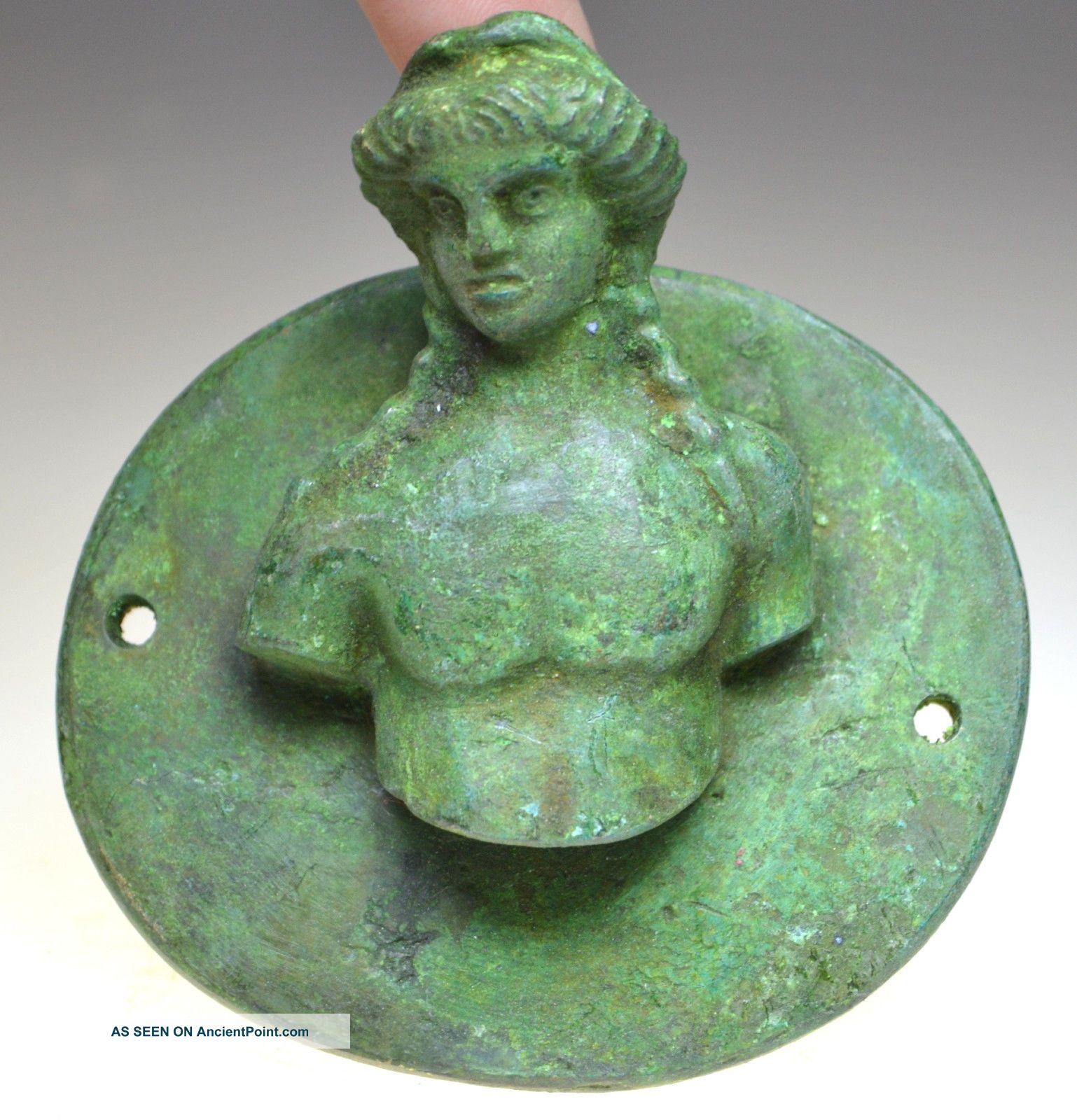 Roman Bronze Roundel Showing Bust Of Goddess Roman photo